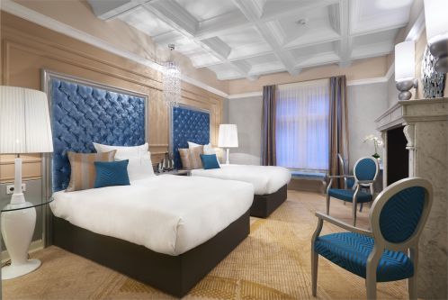 Grand Luxury Classical Music Room with 2 Full Beds and a City View.