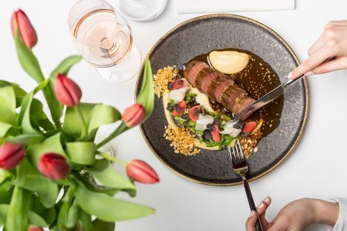 Roasted mangalica pork tenderloin, smoked bacon, parsley root puree, snow pea ragout, fermented radish